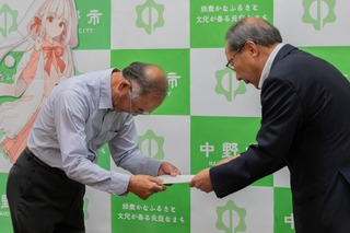 伝達式の写真
